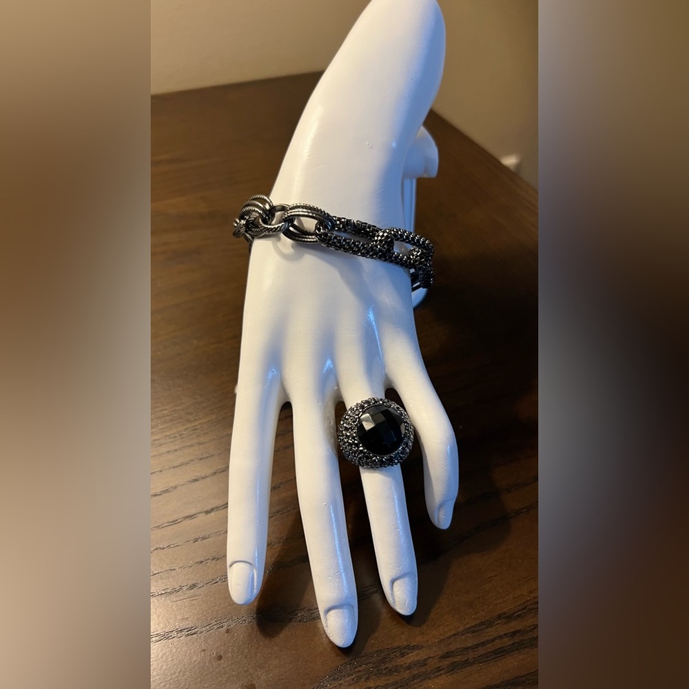 Gunmetal chain bracket.